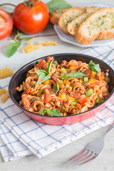 Wall Mural - Pasta with tomato sauce in pan.