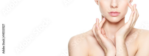Cuadros en Lienzo Beautiful Young Blond Woman with Perfect Skin touching her face
