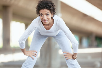 Young Woman Exercising Outdoors