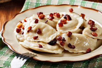 Wall Mural - Dumplings with meat or cabbage and mushroom or cheese seasoned fried bacon