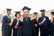© Syda Productions - happy student with diploma pointing finger at you