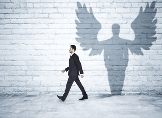 Poster - Walking businessman with angel shadow