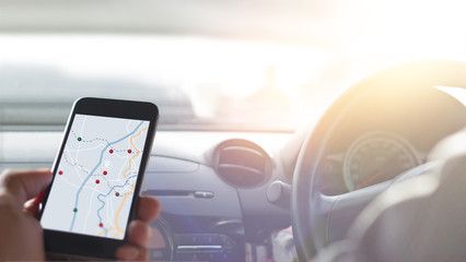 Poster - Hand using smartphone GPS navigation inside car, all on mobile screen are designed up
