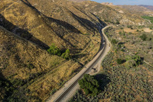 Bending Winding Railroad Tracks Lies Through The Desert Hills Of Southern California.