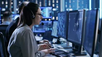 Poster - In Government Agency System Surveillance Center Employees Trace Criminal with Help of GPS. They Room is Full of Displays with Various Data on Them. Shot on RED EPIC-W 8K Helium Cinema Camera.