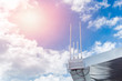 © Quality Stock Arts - WIFI antenna outdoor at roof hotspot long range digital data signal transport against blue sunny day sky