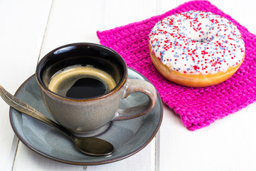 Fresh sweet donut with white icing