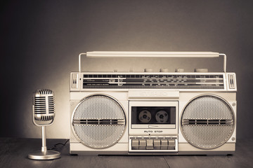Wall Mural - retro stereo portable radio with cassette tape recorder and microphone. old vintage style sepia phot