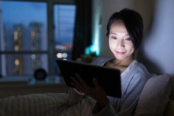 Sticker - Woman using digital tablet in home