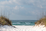 Fototapeta Przestrzenne - A path through the sand dunes leading to the beach.