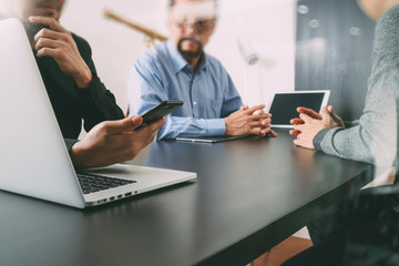 Poster - co working team meeting concept,businessman using smart phone and digital tablet and laptop computer in modern office