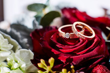 Wedding Rings. Background Rings With Flowers