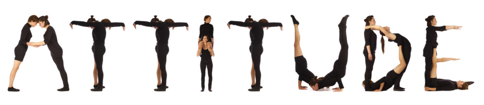 Black dressed people forming word ATTITUDE