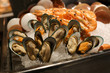 Seafood, mussels, shrimp on ice. Dining