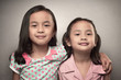 © Leo Lintang - Portrait of asian little girl embracing her sister