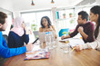 © gpointstudio - Multi ethnic group on business meeting