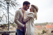 © NDABCREATIVITY - Happy couple in love hugging outdoor