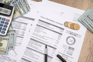 income statement with dollar cash and pen, bank statement, finance saving and investment concept.