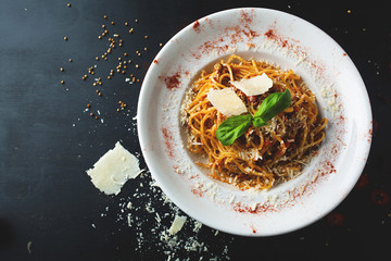 Canvas Print - Delicious spaghetti bolognese with cheese and spices and meat