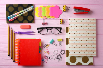 Wall Mural - Notebooks and different stationery on wooden background