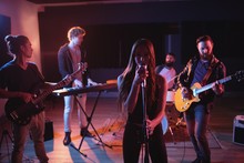 Band Performing In Studio