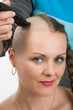 © ArtushFoto - beautiful middle age woman cancer patient shaving hair