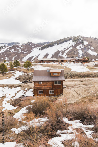 Log Cabin In Snowy Mountain Town Buy This Stock Photo And