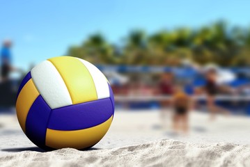 Volleyball game on sandy beach