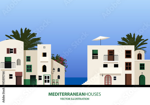 Fotografía Mediterranean houses, palms and blue sky bakground