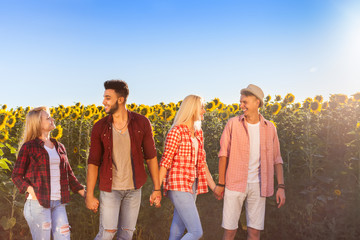 Wall Mural - people group friends outdoor countryside sunflowers field blue sky two couple happy smile, summer su