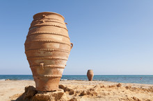Amphora On The Rocky Beach