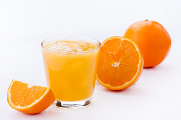 Poster - glass of orange juice, fresh on a light background