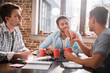 © LIGHTFIELD STUDIOS - Group of young professionals working on business project together