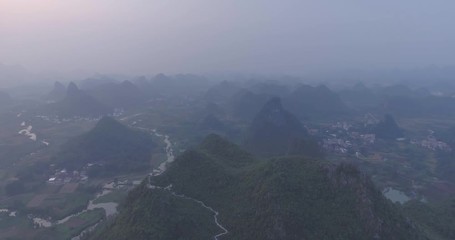 Poster - Beautiful aerial landscape of Guilin,Li River, karst mountains in Cuiping Village at sunset. Top view of area located in Yangshuo County,Guangxi Province,China.Travelling to unique destination concept