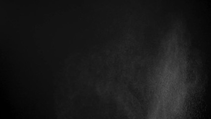 Wall Mural - white powder exploding isolated on black