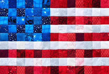 Square pieces of fabrics selected and stitched like a flag of USA