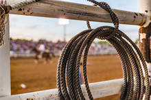 Rope Tied To A Fence At A Rodeo