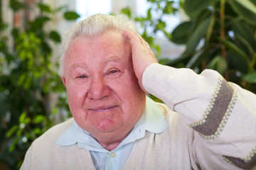 Wall Mural - Elderly man having a headache