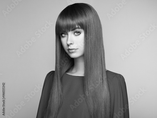 Portrait Of Beautiful Woman With Red Hair Colored Long Haircut