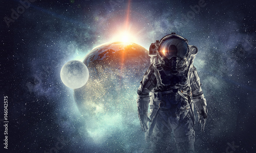 Astronaut in outer space. Mixed media Fototapeta