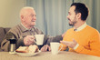 © JackF - Elderly father and son breakfast