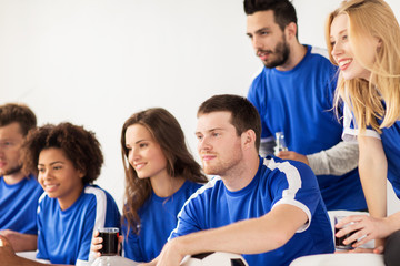 Wall Mural - friends or football fans watching soccer at home