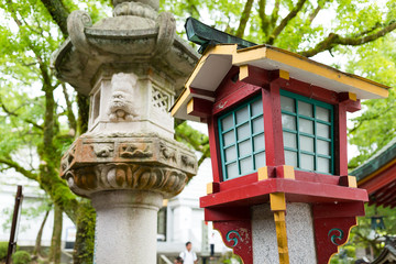 Poster - Japanese stone and wooden lantern in temple