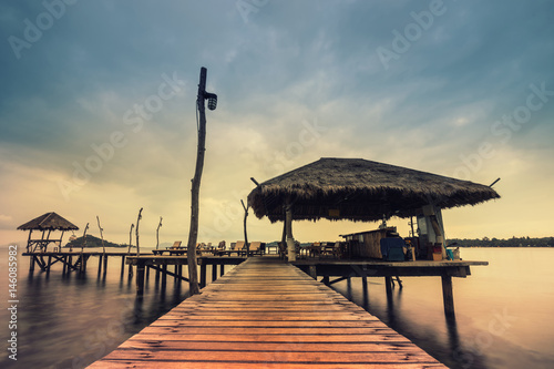 abstract retro ocean dock wood bridge in the sea vintage filter - can use to display or montage on product