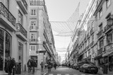 Fototapeta  - Lisbon, Portugal.- January 11, 2017: Old Town Lisbon on January 11, 2017. street view of typical houses in Lisbon, Portugal, Europe