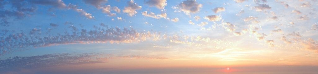 Wall Mural - sunset sky panorama with clouds