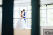 © ShevarevAlex - newly married on the background of Windows