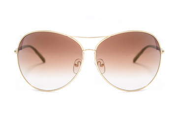 Sunglasses in an iron frame with brown glass isolated on white