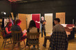 © Marc Romanelli/Blend Images - Teacher talking to students in theater class