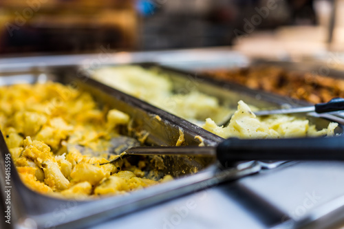 Fotografie, Obraz Self serve mac and cheese at buffet with scoop